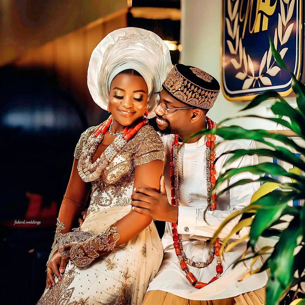 Nigerian couple celebrating in traditional wedding attire